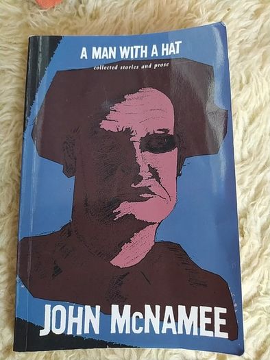 A Man With A Hat / John McNamee