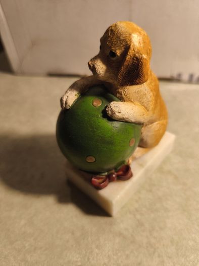 Vintage  Puppy Figurine Holding a ball on marble plinth