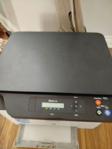 Samsung Xpress colour laser printer and scanner selling with  2 colour toner cartridges