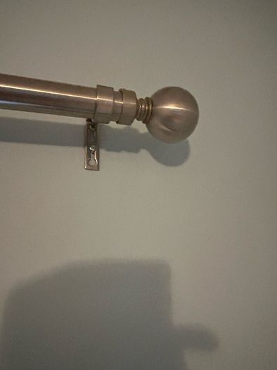 Silver curtain pole