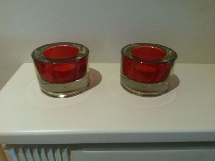 Two red tealight holders