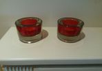 Two red tealight holders