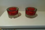 Two red tealight holders