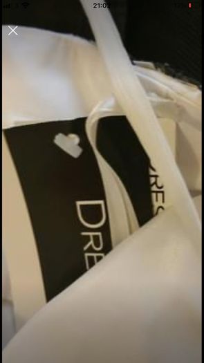 Brand new with tag designer handmade wedding dress by Dresscode. Grecian style with embellishments