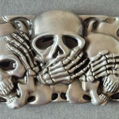 Belt buckle, skull design.