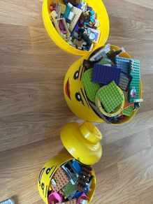 large lego and small lego heads with lego