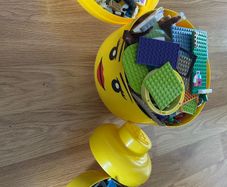 large lego and small lego heads with lego