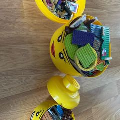 large lego and small lego heads with lego