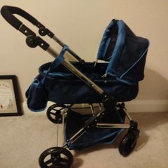 Doll Pram silver cross. Pristine condition except for a small rip on the basket . All accessories included as per picture. Never used outside