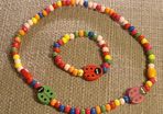 Necklace and bracelet made of wooden beads