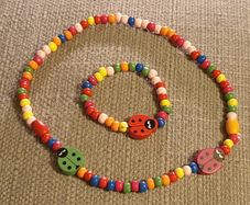 Necklace and bracelet made of wooden beads