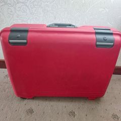 Red hard-shell suitcase