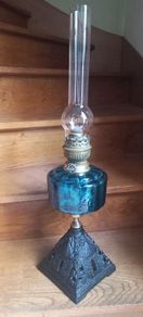 Antique Blue Glass Brass and cast iron metal large table oil lamp in very good condition and working