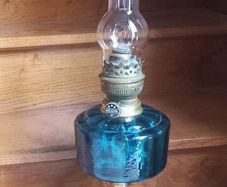 Antique Blue Glass Brass and cast iron metal large table oil lamp in very good condition and working