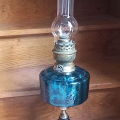 Antique Blue Glass Brass and cast iron metal large table oil lamp in very good condition and working