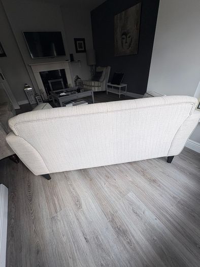Modern two-seater sofa in light grey fabric