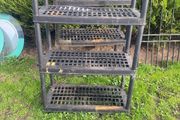 two plastic shelving units