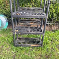two plastic shelving units