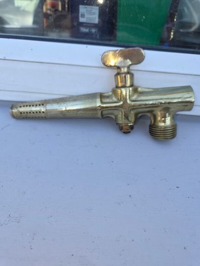old brass  whiskey  tap