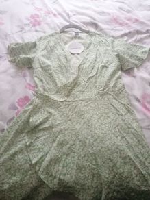 lovely wrap dress brand new with tags on.