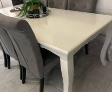 8 seater dining table and 6 grey velvet button detailing chairs