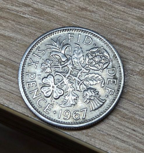 Bank bag of 6d coins