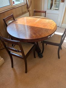 Antique dining table and 6 chairs.