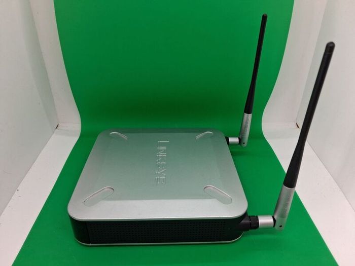 Postage - Linksys Cisco WET200 Wireless Ethernet Bridge Router.