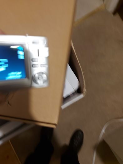 Z880 Digital Camera, Takes 2AA Batteries, working fine, has a modification that doesn't affect its performance