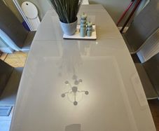 grey glass top dining table (Extendable