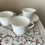 Three Wedgwood Strawberry and Vine cups and one saucer Image 2