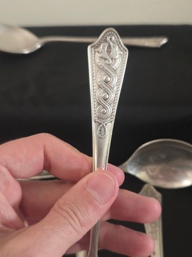 Collection of 11 Vintage Newbridge Silverware Celtic Dragon Design Spoons from Jurys Hotel