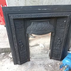 front of fireplace