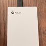Xbox Series S with Xbox official Seagate 2TB game drive and two Xbox controllers Image 5