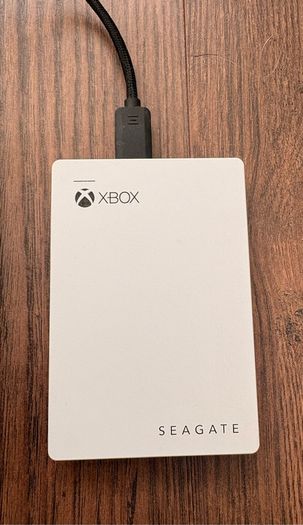 Xbox Series S with Xbox official Seagate 2TB game drive and two Xbox controllers