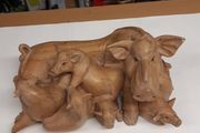 Wood carving sow and piglets