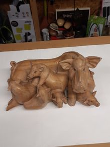 Wood carving sow and piglets