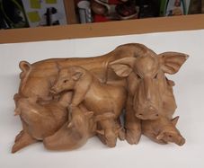 Wood carving sow and piglets