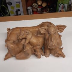 Wood carving sow and piglets