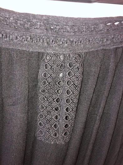 Black playsuit (size 8)