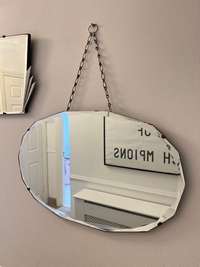 oval antique art deco mirror