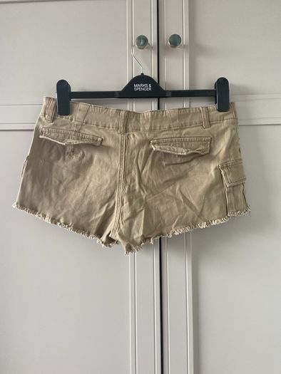 mini shorts with studded pocket and distressed hem