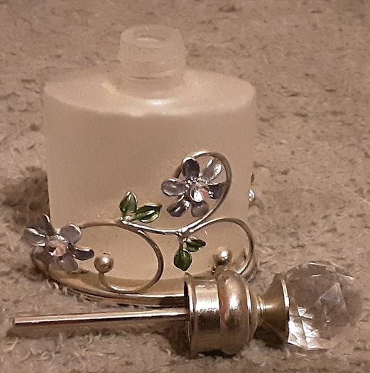 Nice glass and white metal perfume bottle