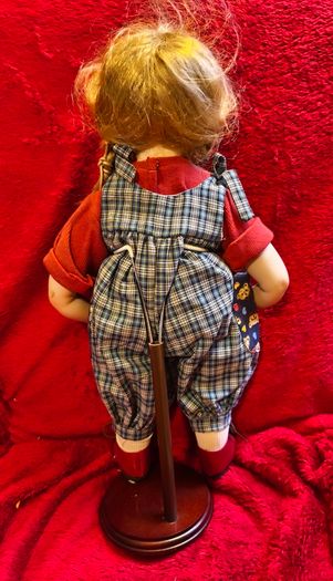 Collectable Porcelain collector doll with stand