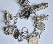 Vintage Irish Sterling Silver 14pc Charm Bracelet, Thomas O'Connor Charm Maker. Inc 1942 Pre Decimal Threepence, Dated Heart Padlock, Dublin Hallmarked