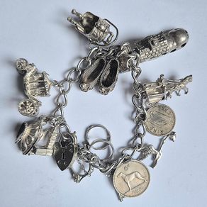 Vintage Irish Sterling Silver 14pc Charm Bracelet, Thomas O'Connor Charm Maker. Inc 1942 Pre Decimal Threepence, Dated Heart Padlock, Dublin Hallmarked