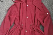 Burgundy windbreaker jacket