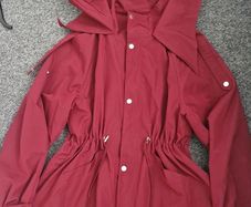 Burgundy windbreaker jacket