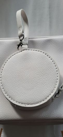Stitch crossbody bag with matching purse.