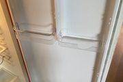 Smeg fridge freezer dairy shelf